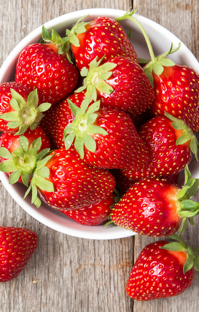 Red strawberry in a bowl